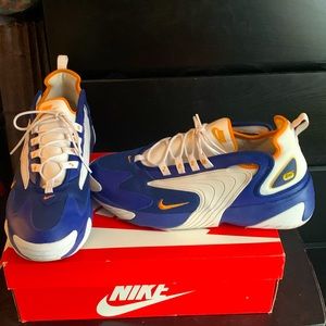 Blue, white and orange Nikes